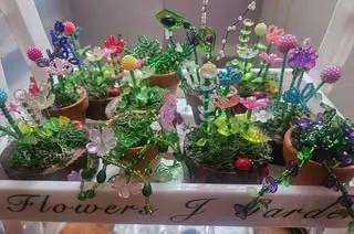 A colorful collection of handmade beaded flowers