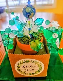 Green beaded plant in a gift box