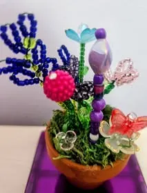Whimsical beaded garden with purple accents
